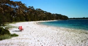 The sun shines bright over sand so white… it's a view for two over waters so blue, Jervis Bay, NSW