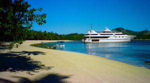 A cruise vessel anchored off the Blue Lagoon beach, Yasawa Group, Fiji