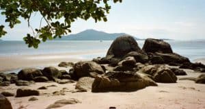 Sculpted granite lines a sandy landing spot, Hinchinbrook Island, QLD