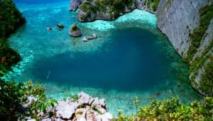 Dafalen “Love Lagoon” – a striking heart shaped pool framed by sheer cliffs, Raja Ampat